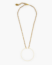 Booster, Julio Designs, Frisco, TX, Delicate brass circle is suspended from delicate micro crystal chain