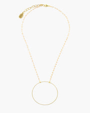 Booster, Julio Designs, Frisco, TX, Delicate brass circle is suspended from delicate micro crystal chain.