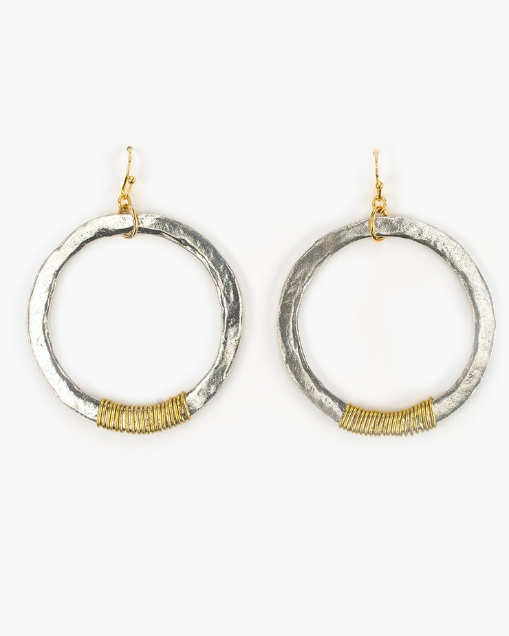 Our large hammered circles with a hand wire-wrapped accent. Mixed metal beauty! For the smaller version see our ER271. Wire Wrapped Large Hoop Earring (ER272) Handmade in Frisco TX, Julio Designs