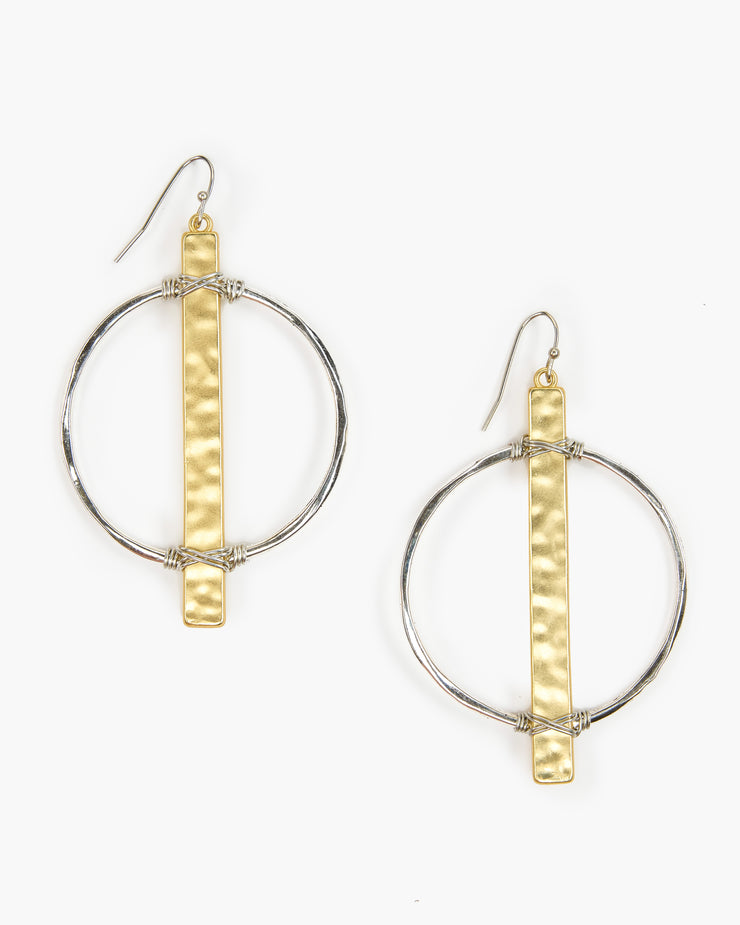 Beautifully wire wrapped hammered bar on metal circle earring. This earring will quickly become one of your favorites. Handmade in Frisco TX, Julio Designs