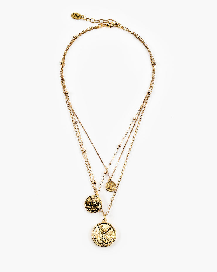 The Eleanor Necklace contains three coins suspended from three separate strands all connected into one necklace. Handmade in Frisco TX, Julio Designs