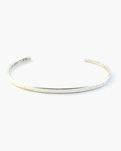 A subtle statement alone, or a slender shine when mixed in with other bracelets Hammered narrow cuff bracelet, the Fine Line Cuff Bracelet is the basis for every great bracelet stack