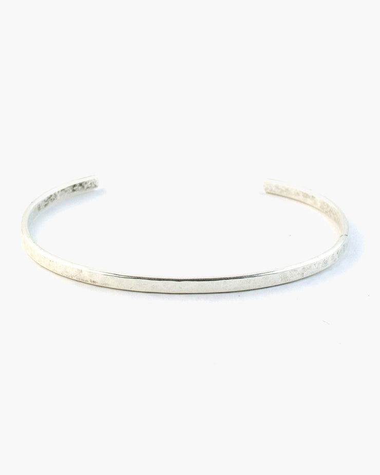 A subtle statement alone, or a slender shine when mixed in with other bracelets Hammered narrow cuff bracelet, the Fine Line Cuff Bracelet is the basis for every great bracelet stack