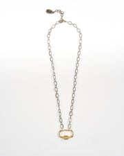 This beautiful delicate golden necklace consists of a small carabiner pendant with sparkling CZ accents on cable chain. Golden Grahams Delicate Carabiner Necklace.