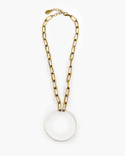 A brass circle is suspended from paperclip chain. Beautiful on its own or layered, the Kit Kat Necklace is sure to become one of your go-to favorites. Kit Kat Paperclip Chain Circle Necklace