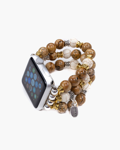 Triple strand watchband of gemstones, Czech crystals and metal spacers on stretch cord for your Apple watch.  Brackets are 38mm but will fit 42mm watch faces.  The Tinker  Apple Watchband is sized to fit an average 7" wrist, but can be ordered shorter or longer. Julio Designs, Handmade in Frisco TX